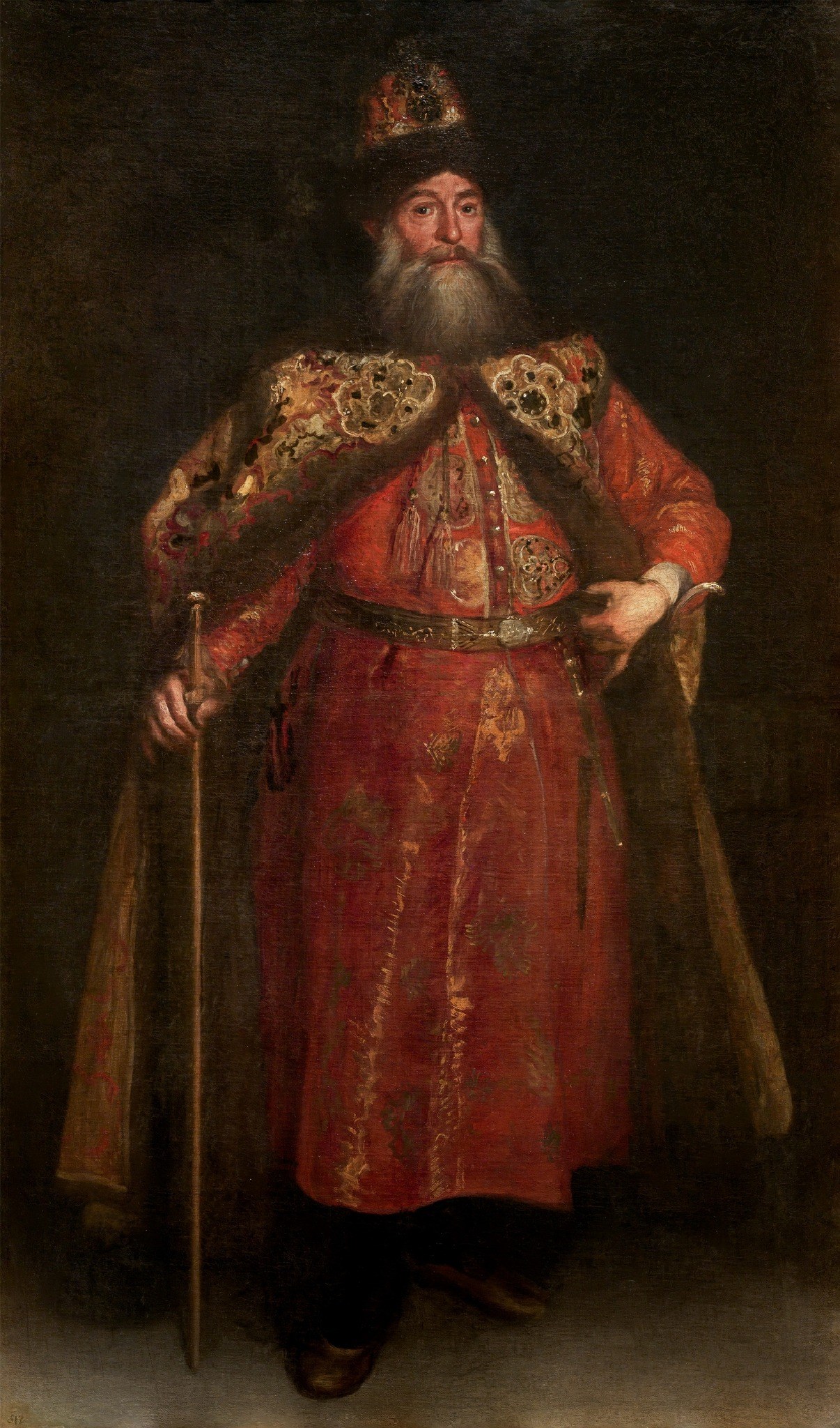 The deep, dark background isolates the figure, emphasizing his presence and the details of his costume.