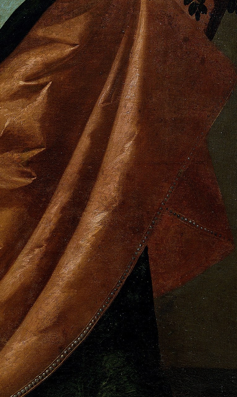 The heavy, textured fabric of the skirt, with its subtle sheen, conveys a sense of weight and grandeur.