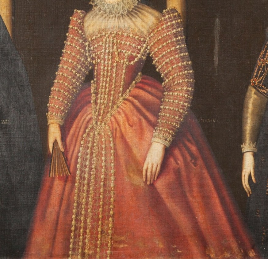 The central figure wears vibrant red.