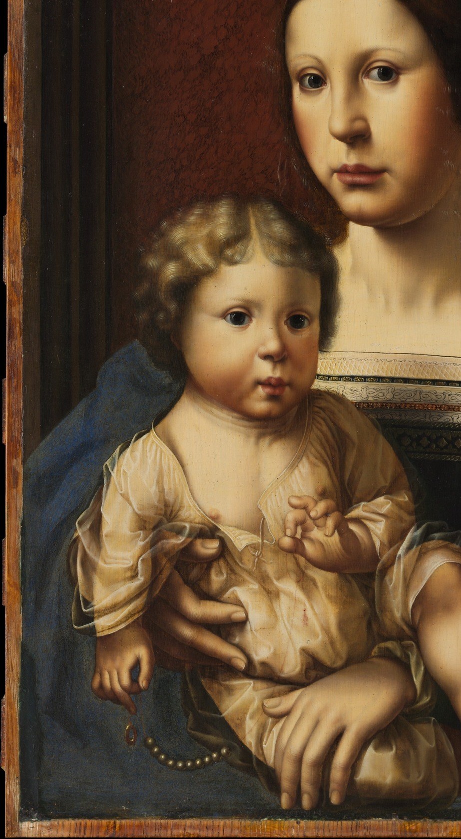 The saturated blue (ultramarine, costly pigment) signals celestial queenship; the gold trim at the collar marks her elevated status.