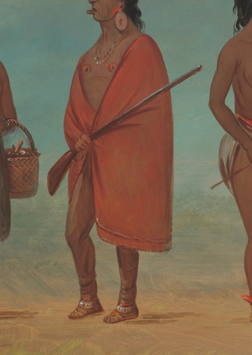 The vibrant color and way it's worn convey importance and cultural attire.