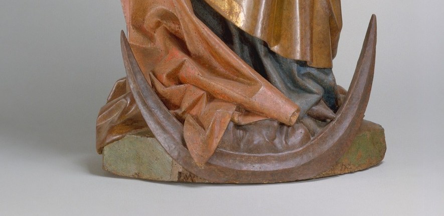 References Revelation 12:1, the Woman clothed with the sun standing on the moon; the upturned horns anchor the figure physically and encode Mary as apocalyptic Queen, triumph over time.