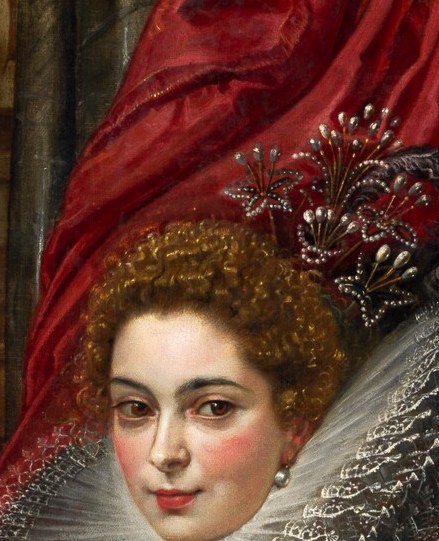 The psychological anchor of the portrait; her calm, slightly cool gaze across the picture plane projects the dignity expected of a newly married Genoese noblewoman.