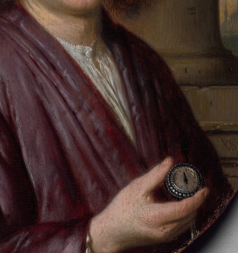 His maroon jacket speaks of luxury.