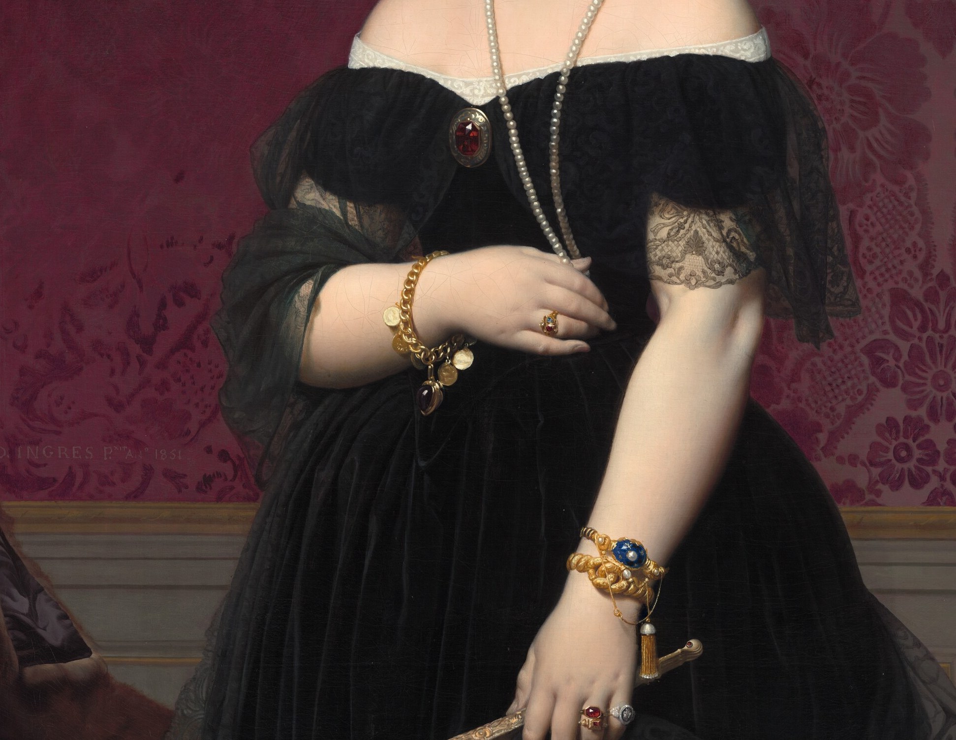 Now look at the black silk gown beneath those shoulders.