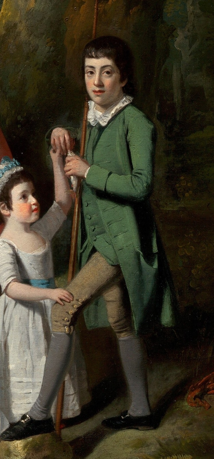 His direct gaze and upright posture indicate a sense of responsibility or leadership.