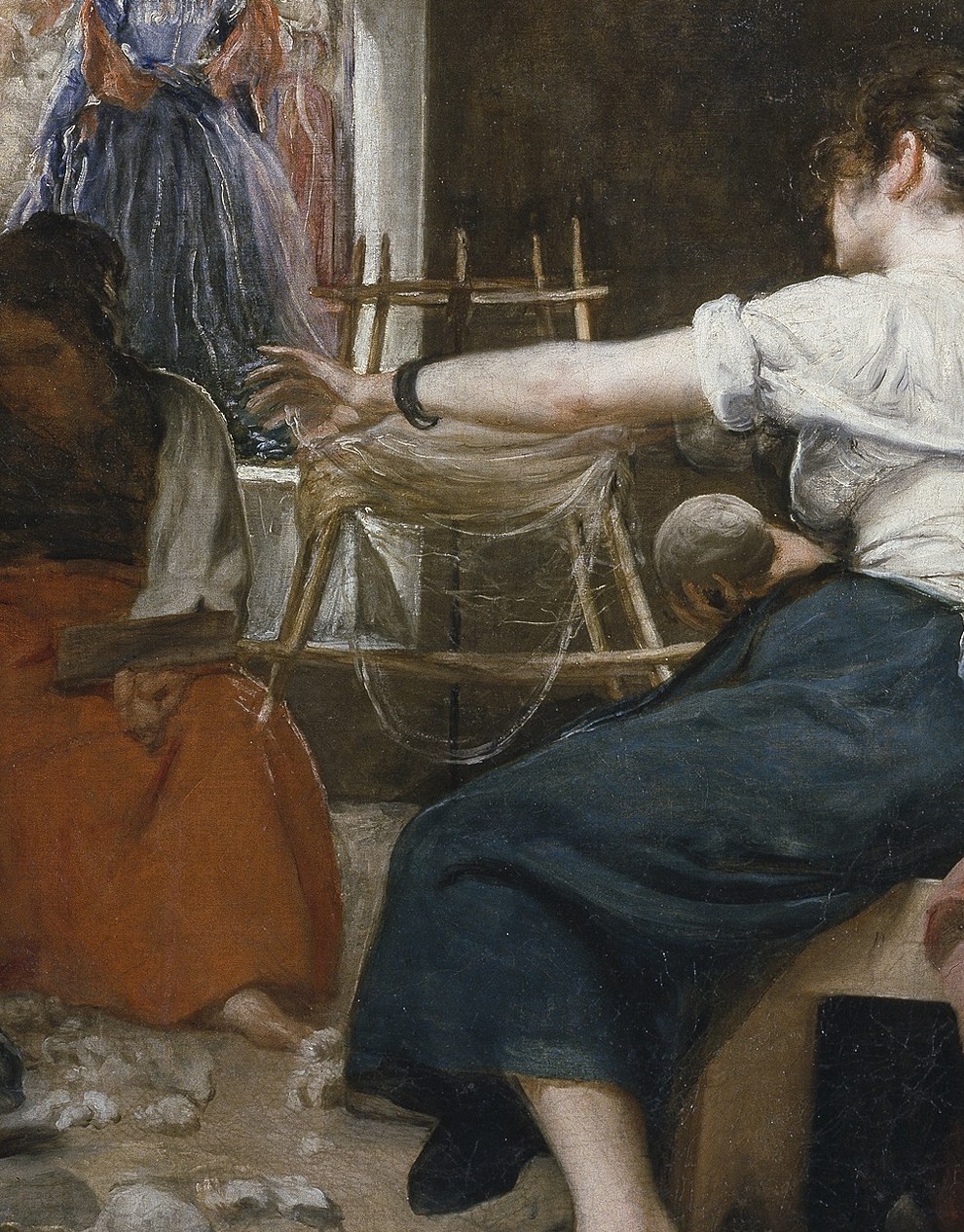 Widely read as Arachne herself; her bare arm and upright posture carry both confidence and vulnerability, she is at the height of her craft, moments before divine judgment arrives.