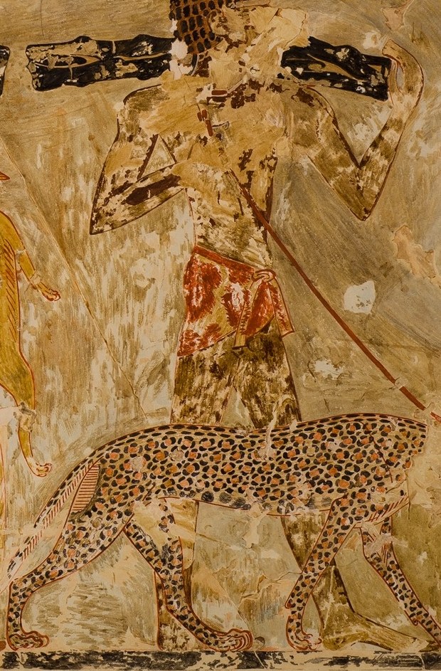 His posture suggests a hunter returning with game, a common theme in tomb depictions of daily life and afterlife provisions.