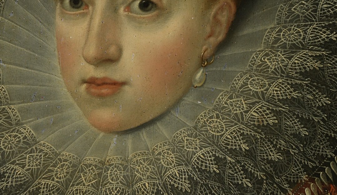 The intricate lace ruff speaks to her immense wealth and status.