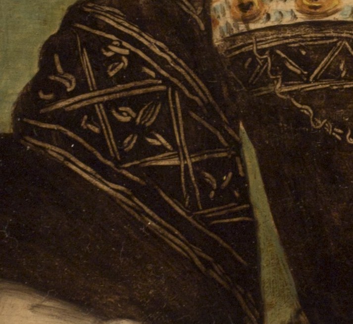 She wore ermine at her wrists, a privilege of nobility.