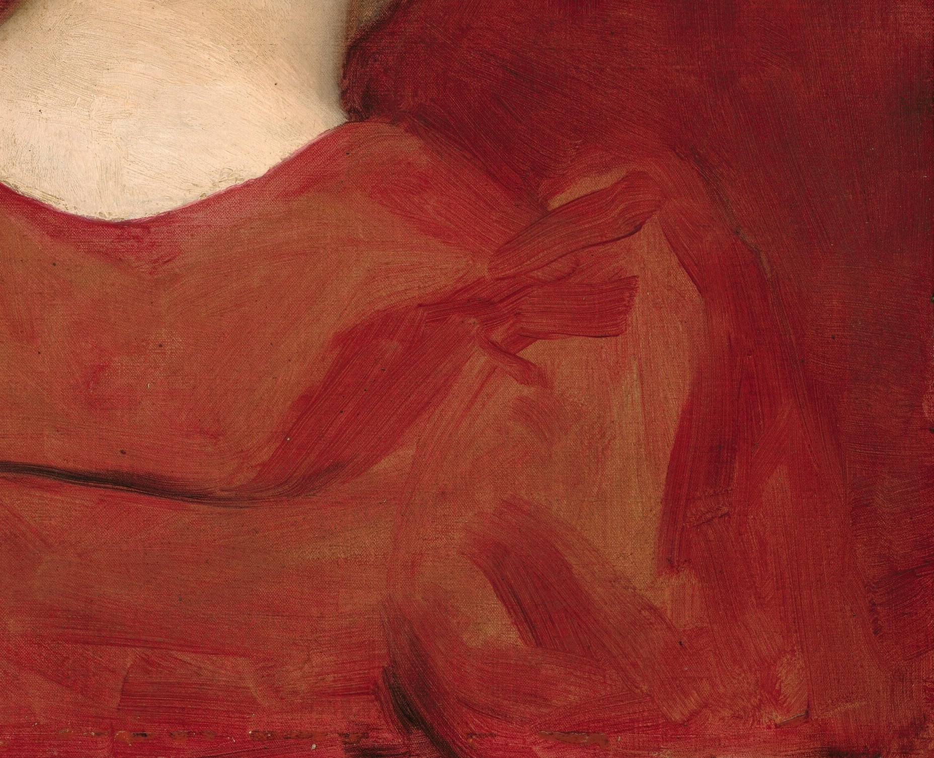 Her expression is composed, her red dress striking.