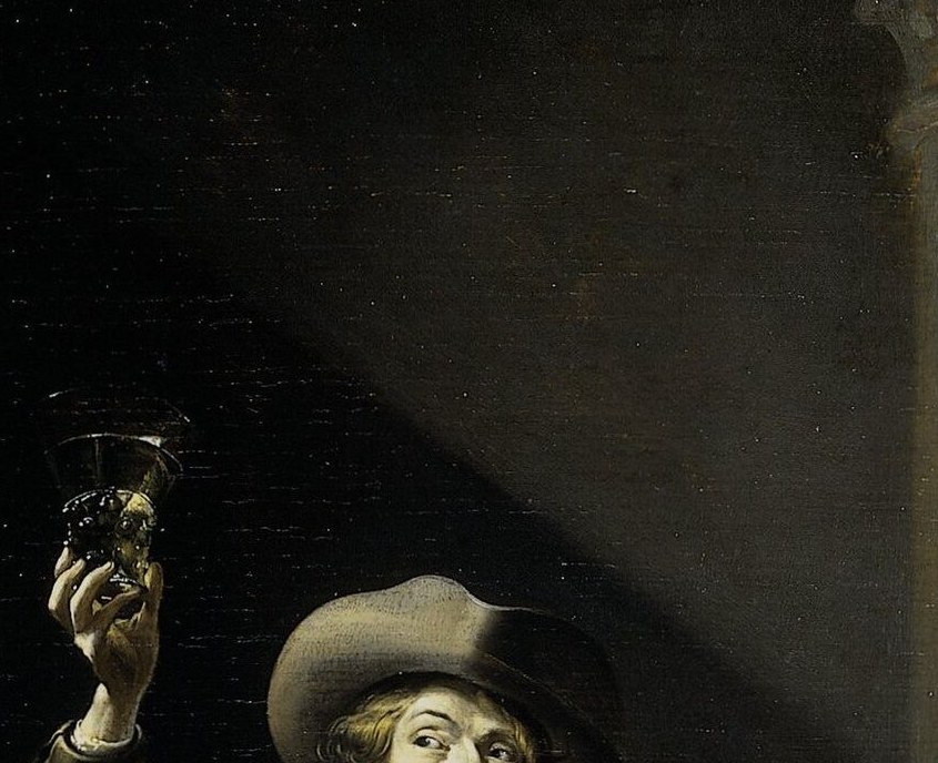 A single glass, held to the light.
