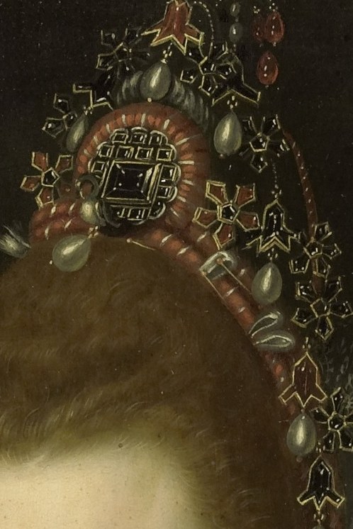 Every detail in her attire speaks of wealth and power.