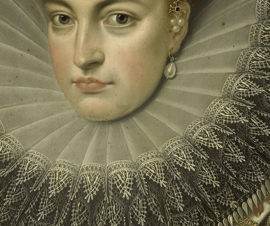 Her ruff collar alone is a masterpiece of intricate lace.