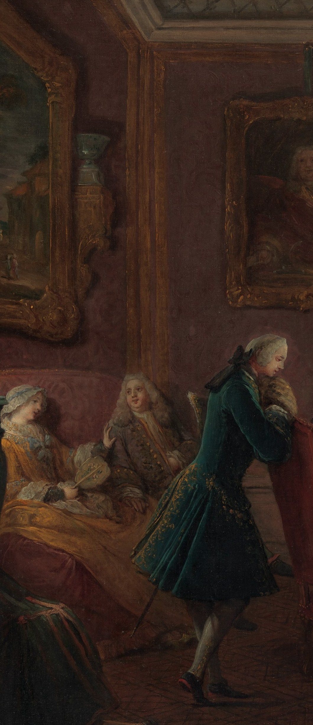 Pivotal compositional axis , his posture and gaze bridge the conversational pair on the left and the lit card table, making him the social mediator of the scene.