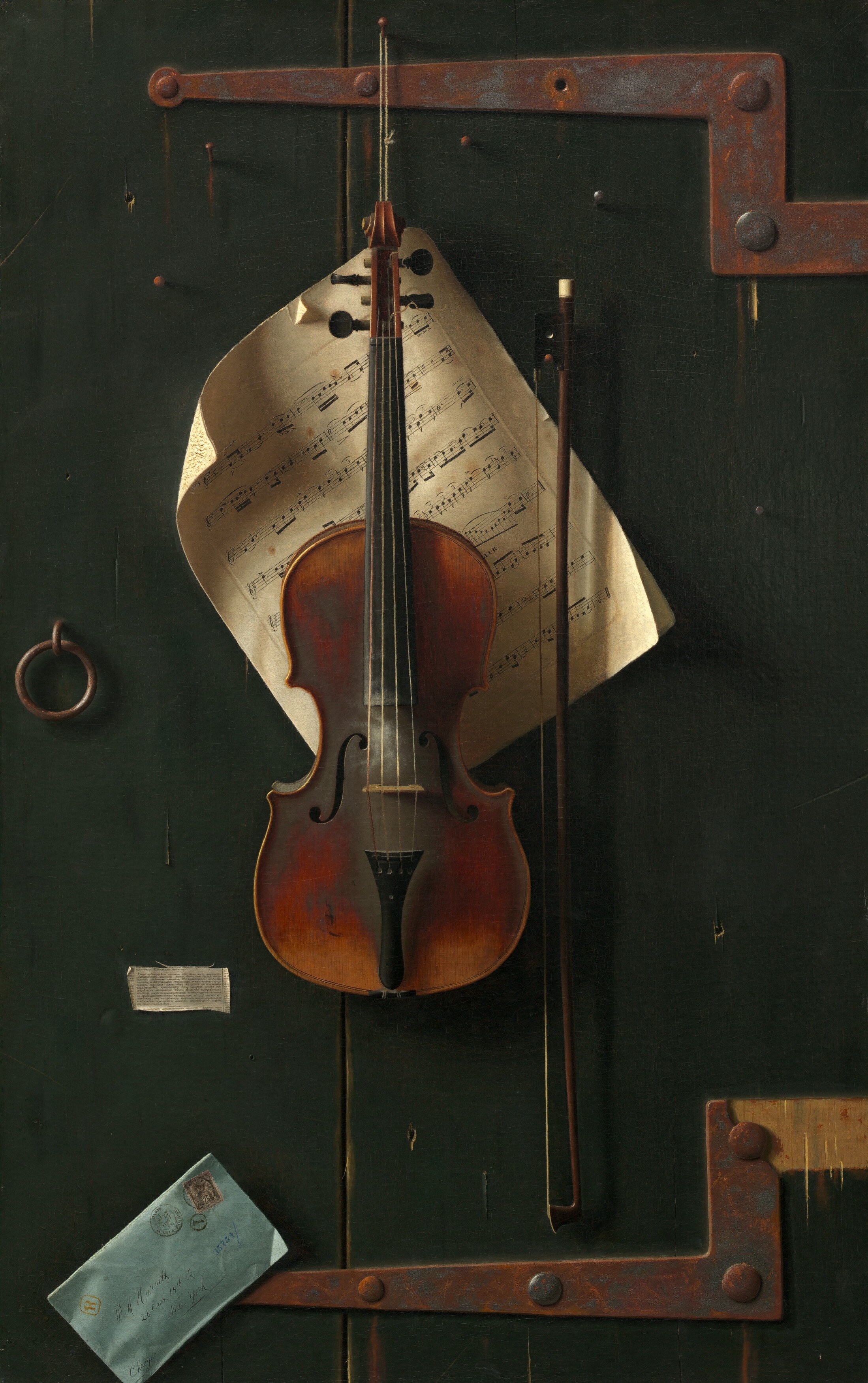 The deep, almost black background makes the objects in the foreground pop, enhancing their presence and detail.
