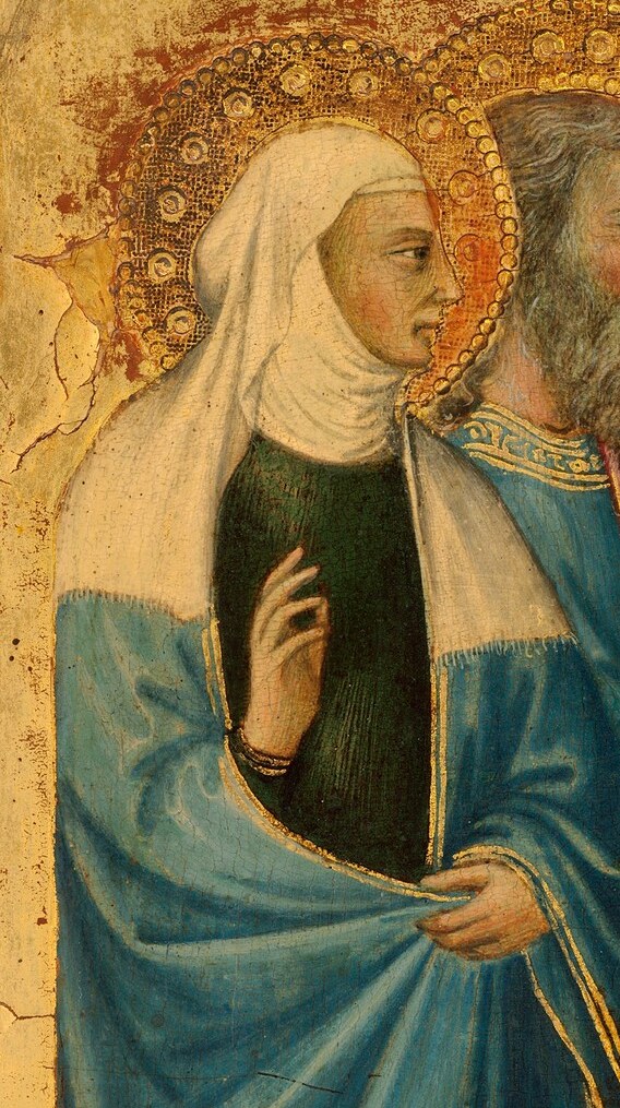 Her protective gesture and the direction of her gaze suggest she is Mary's guardian, guiding her into the Temple.