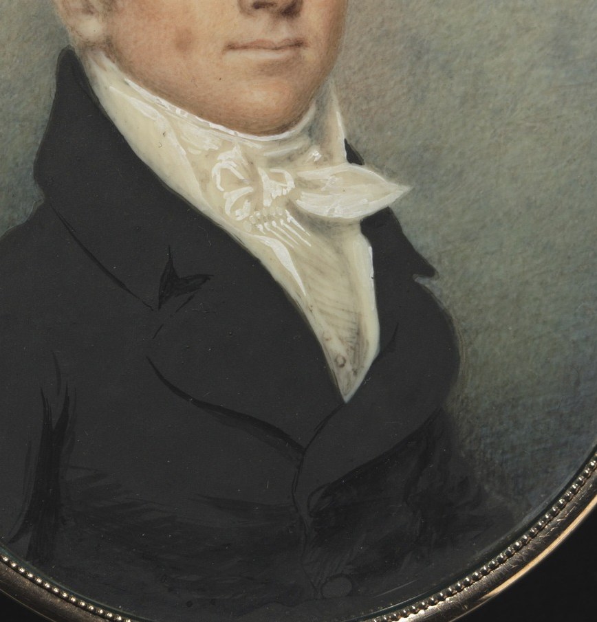The rich, dark fabric of his coat contrasts with his white attire, emphasizing his formal presentation.