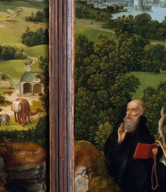 A hermit reads. Another baptizes.