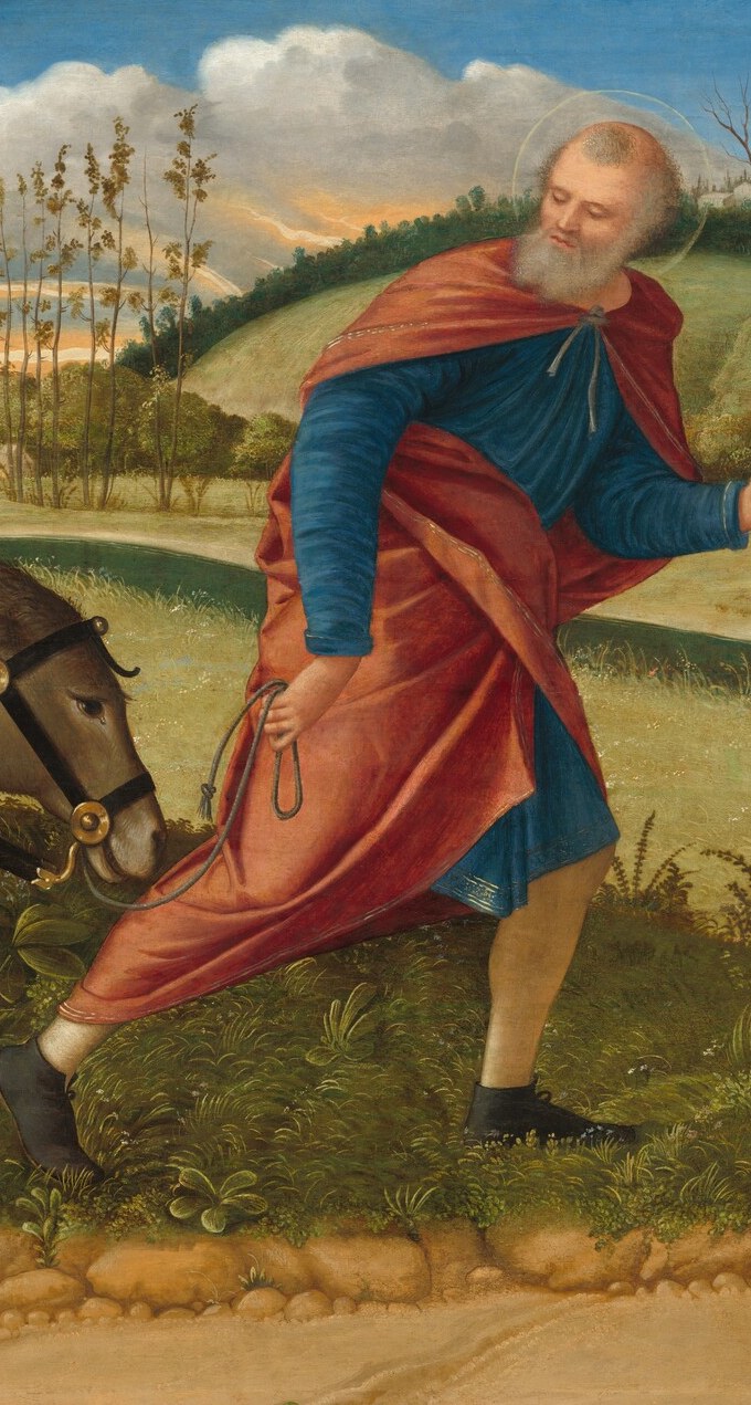 Joseph leads energetically, body angled forward and staff planted, conveying purposeful urgency rarely foregrounded in Flight scenes where he is often passive or trailing.