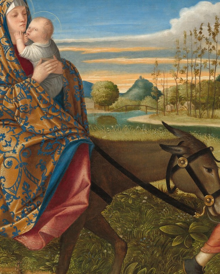 A tour-de-force of late-Carpaccio textile painting , gold damask pattern over Marian blue reads simultaneously as costly fabric and as a reference to the gilded altarpiece tradition; the virtuoso rendering of two overlapping luxury fabrics is a signature trick passage.
