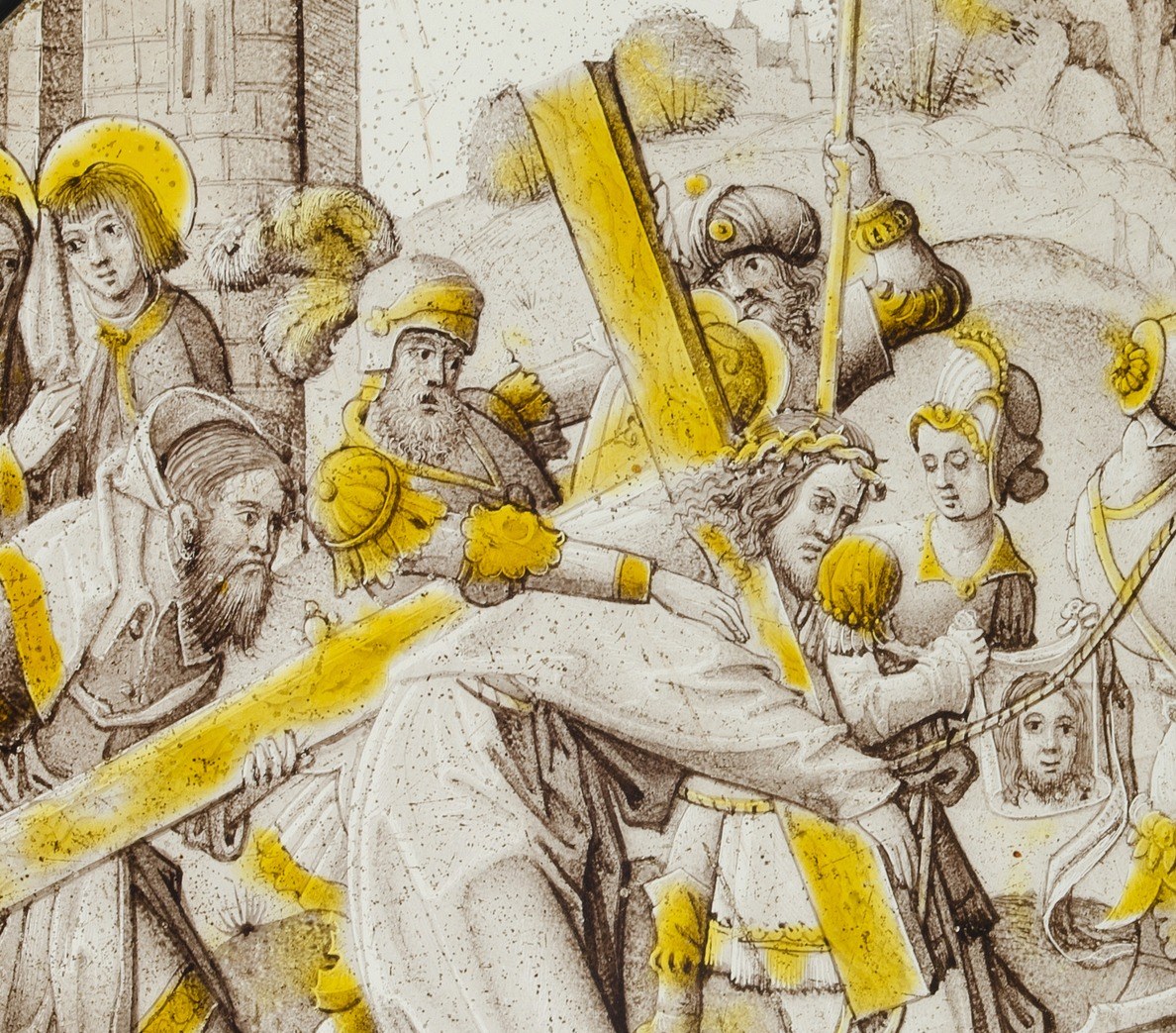 Painted in warm yellow-gold against the grisaille crowd, the cross is the strongest compositional line; its angle bisects the roundel and choreographs every figure around it.