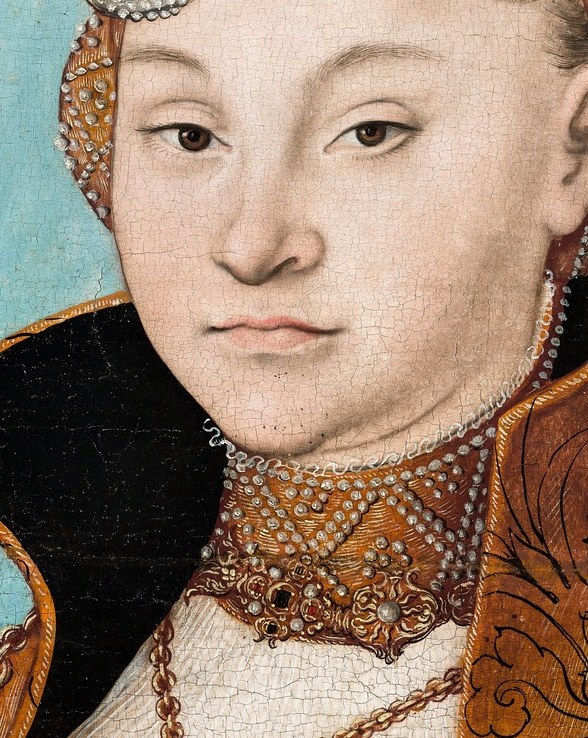 She looks out across five centuries, self-possessed and calm.