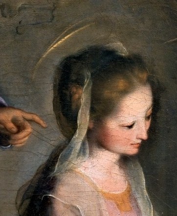 Mary's face shows pure, motherly love.