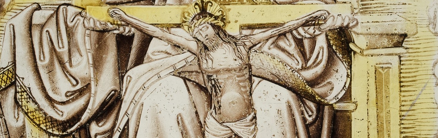 His hands physically hold the cross.