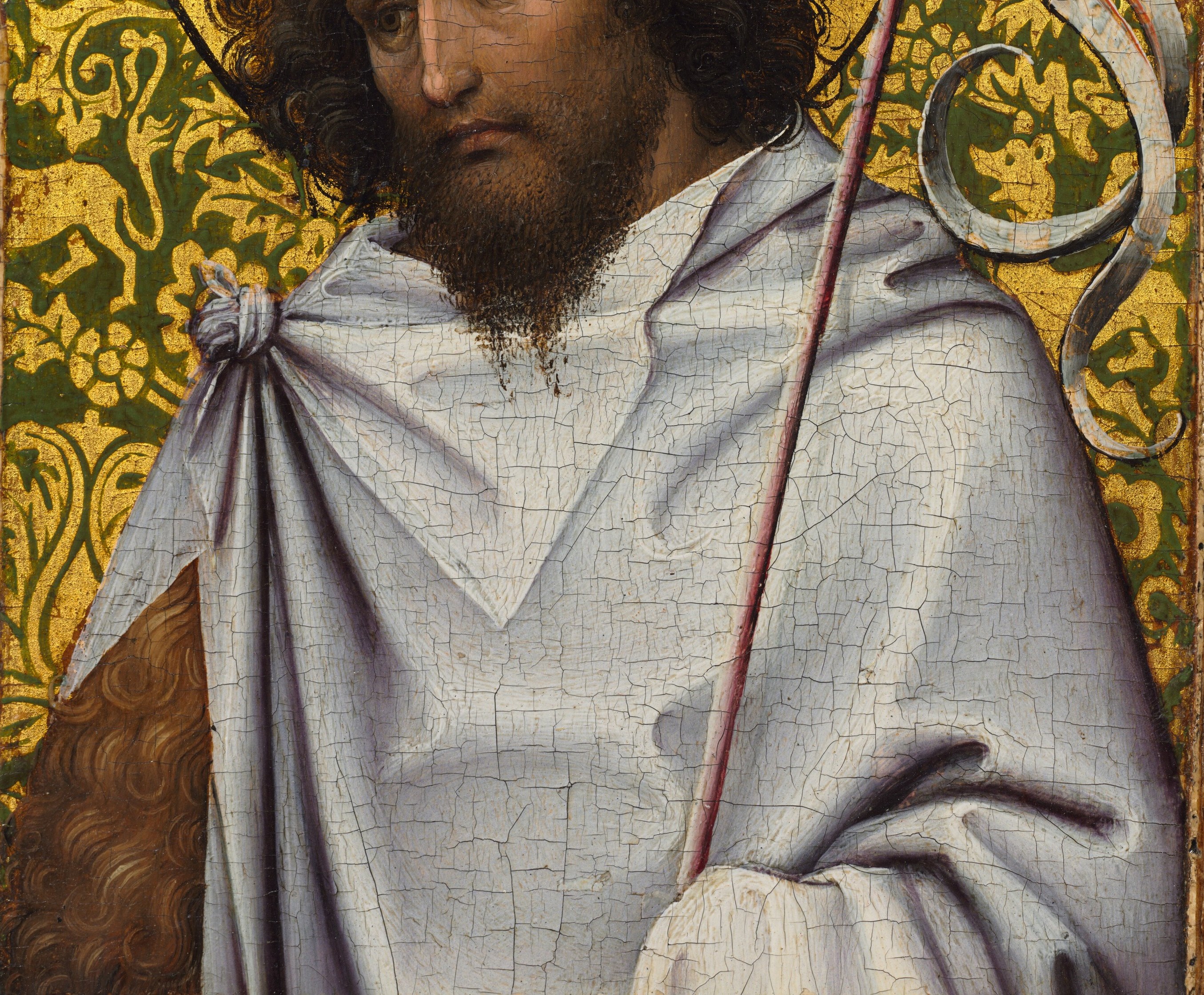 The luminous white cloak shows his mastery of oil paint.