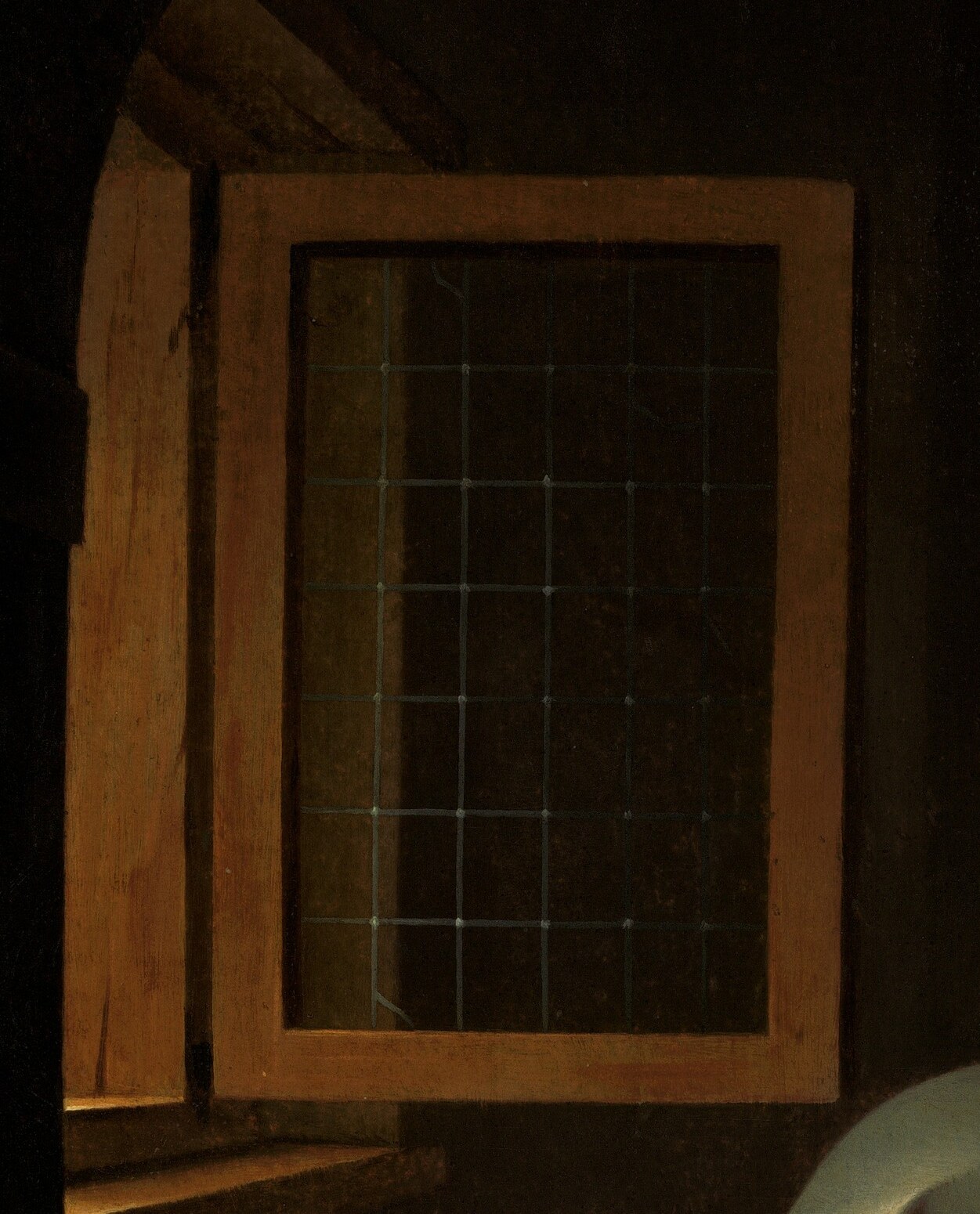Suggests a view to the outside world, but its dark interior and grid imply a sense of confinement or a limited perspective.