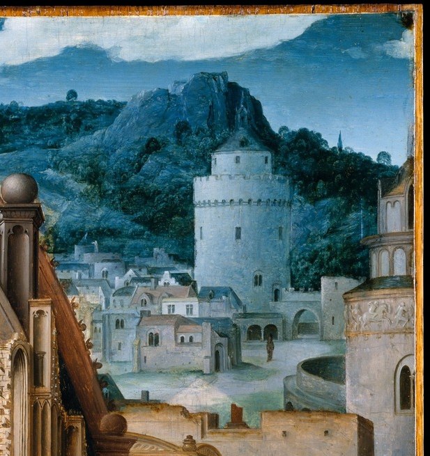 A pale blue-green Flemish town recedes into an atmospheric distance; the aerial perspective technique here demonstrates the Antwerp painter's mastery, and the towers may identify a specific city, a hidden geographical clue.