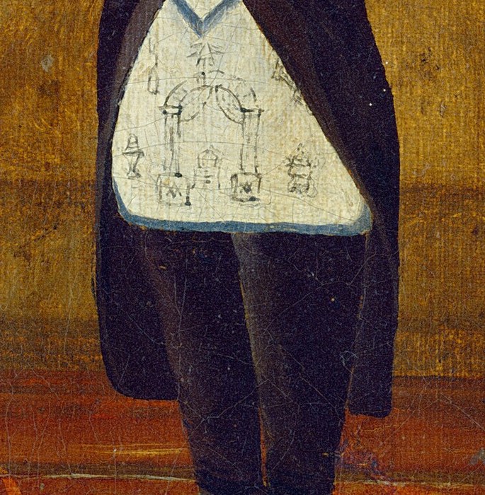 Look at what the painter placed at the center of his chest.