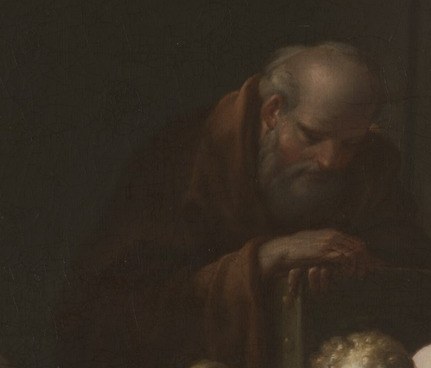 His face shows wisdom and devotion.