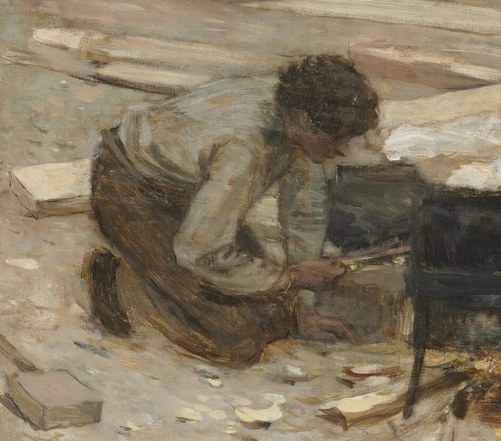 This worker hammers timber with fierce focus.