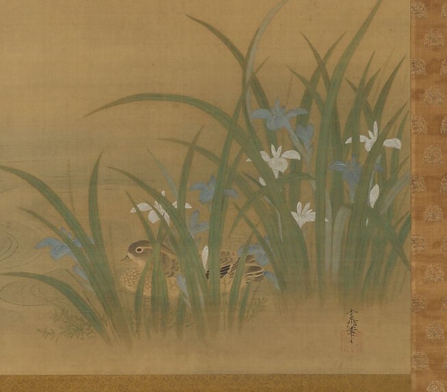 The strong vertical lines of the leaves create a sense of depth and natural growth.