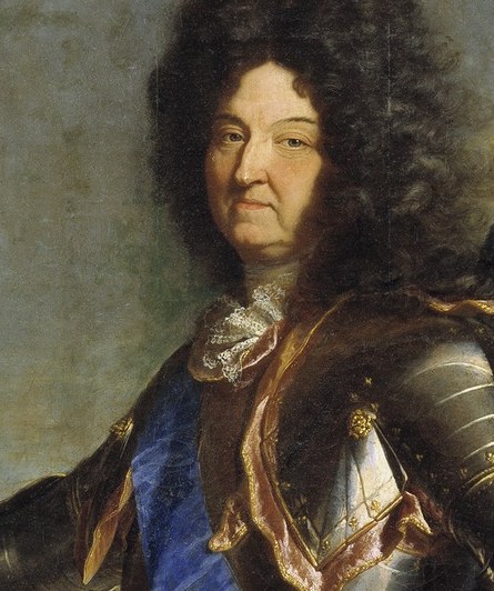 The elaborate, curly wig signifies status and the fashion of the era, emphasizing his role as a symbol of the French monarchy.