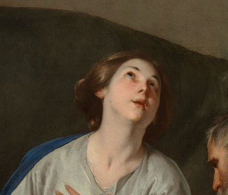 Her gaze is directed upwards, conveying a sense of divine wonder and maternal tenderness.