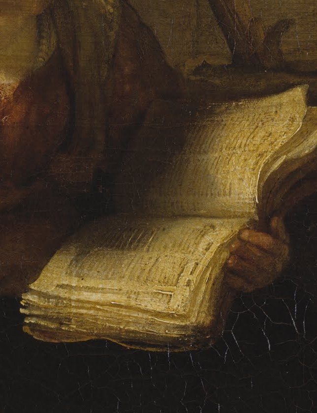 Light falls on scripture they are reading.