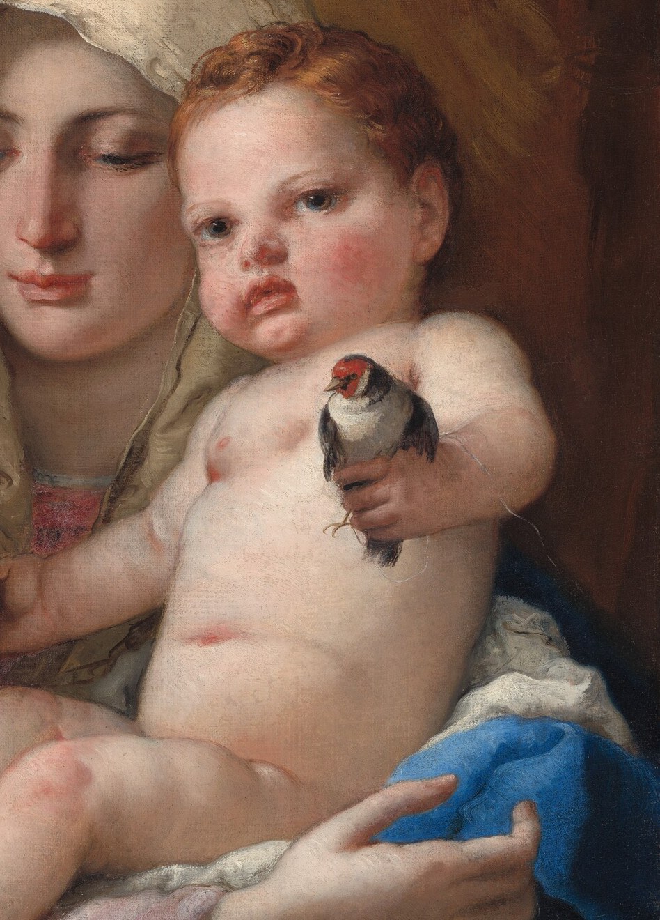Tiepolo's mastery of soft flesh gradients is fully on display here , the subtle coolness in the shadows models infant fat with uncommon delicacy