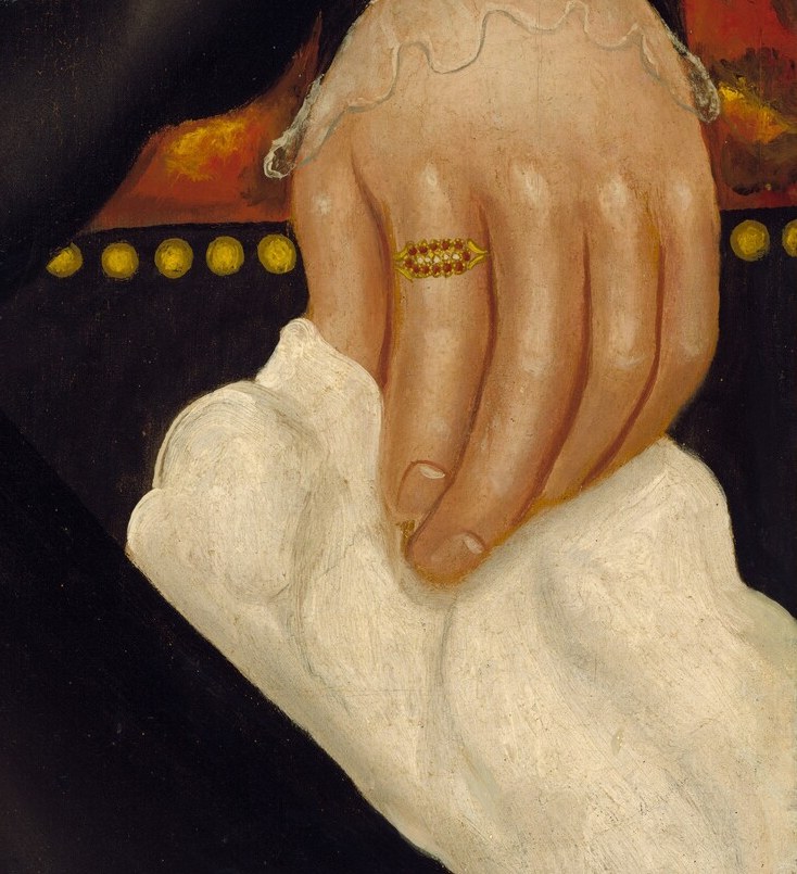 Her delicate right hand holds a simple white cloth.