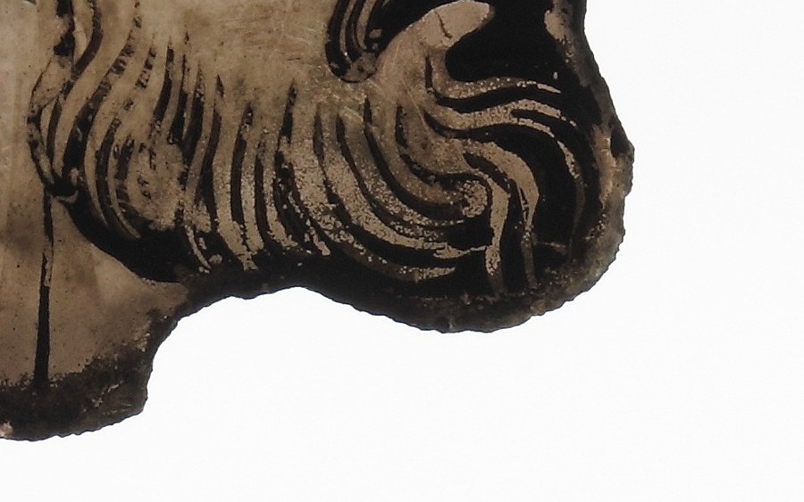 Look closely at his curly beard, rendered with such detail.