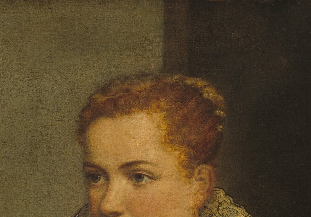 Blonde hair arranged in Venetian Renaissance fashion, possibly secured with pearl pins , signals noble status and places the sitter precisely in 1550s Venetian court fashion