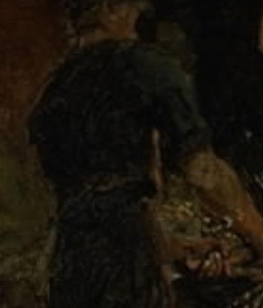 A second man holds the hot metal.