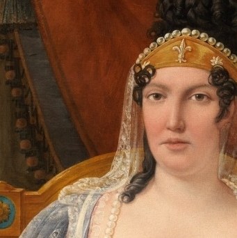 This queen looks stern and weary.