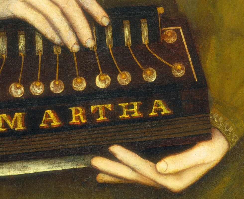 She holds a box that says MARTHA.