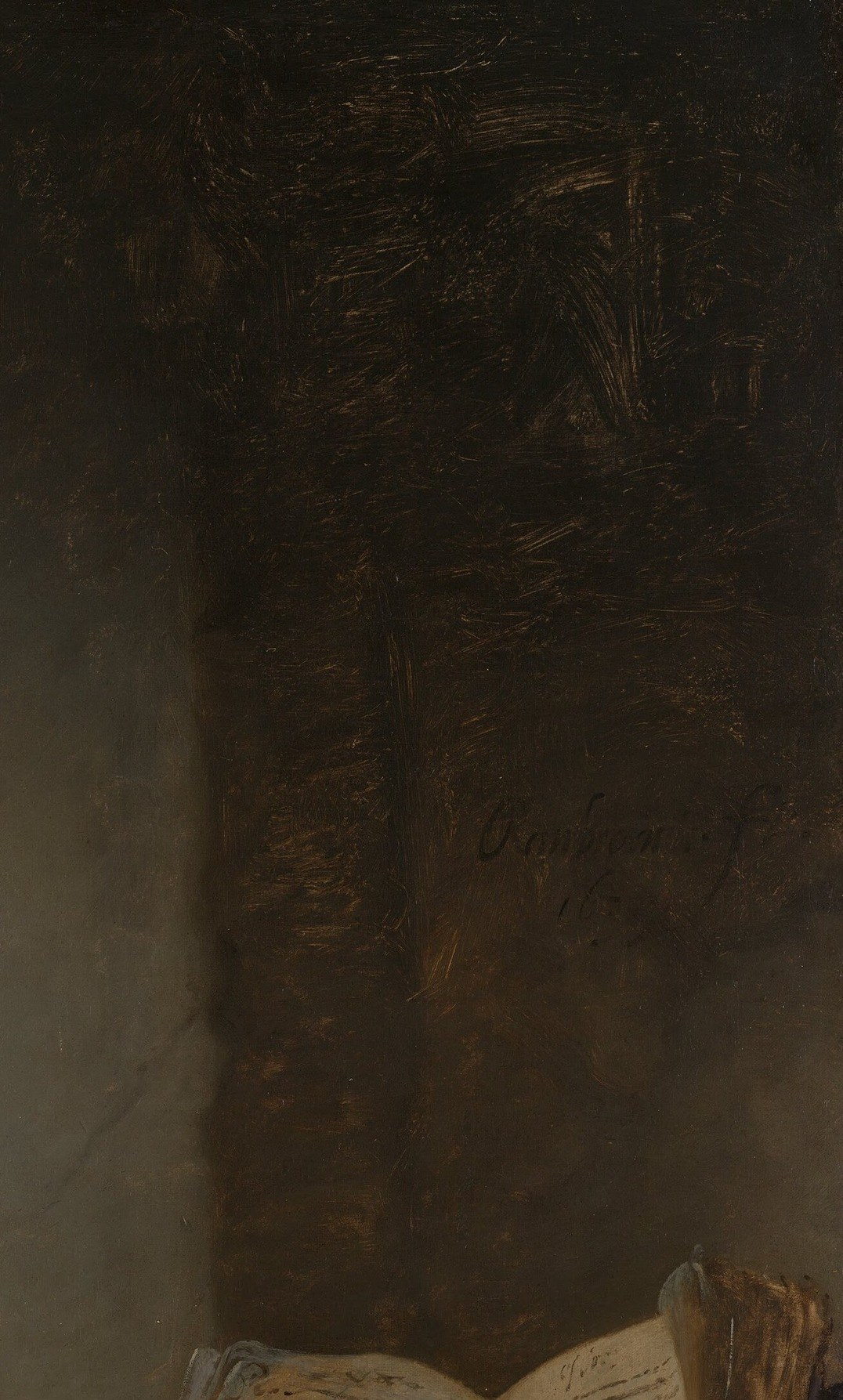 Look closely at the dark background, behind his shoulder.
