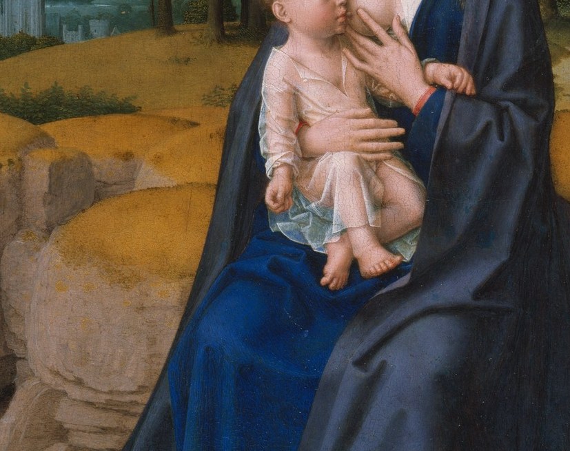 Her hands support his head and body with absolute precision.