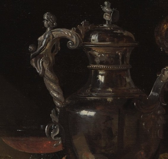 Look at the gleaming silver wine jug.