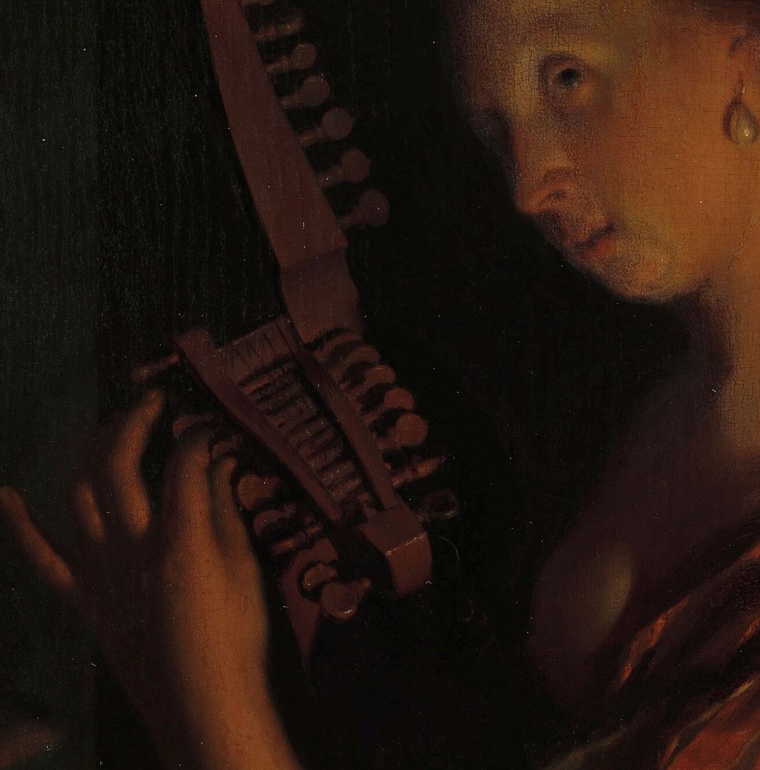 The intricate details of the lute, especially the tuning pegs, highlight the subject's task and the instrument's craftsmanship.